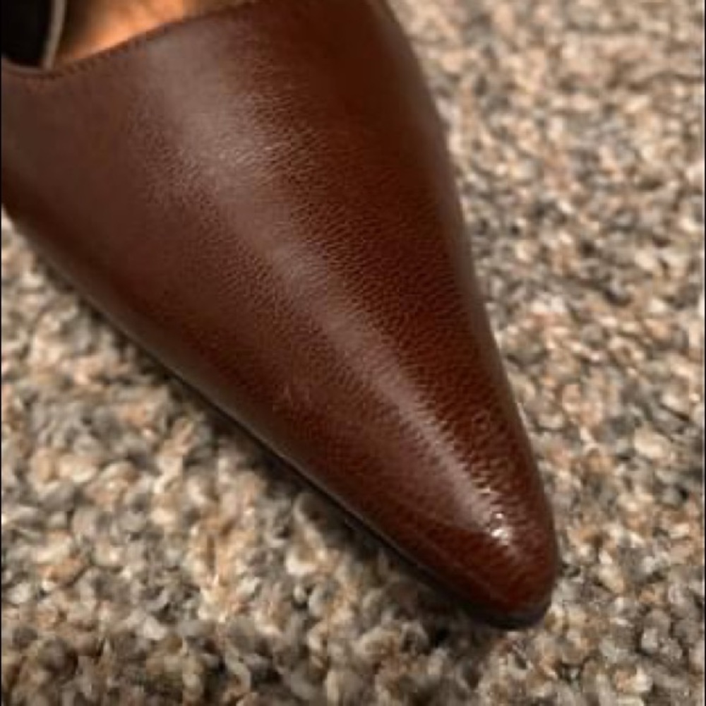 Brown pointy heels